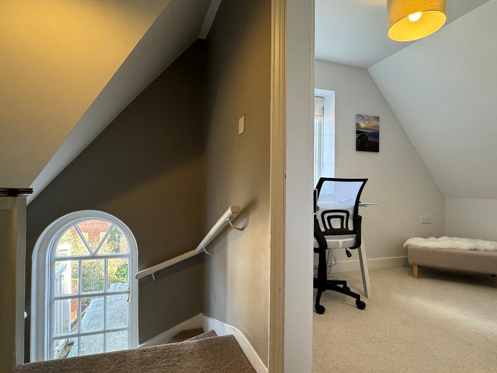 Arched window on stair case