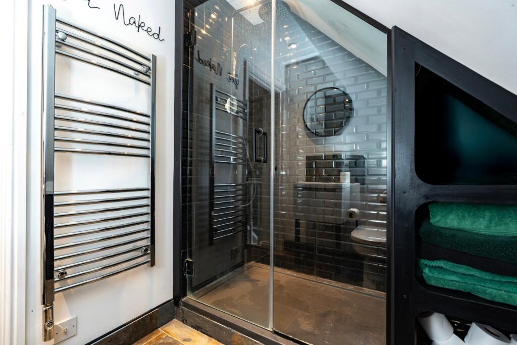 Modern and sleek - the ensuite to the main bedroom