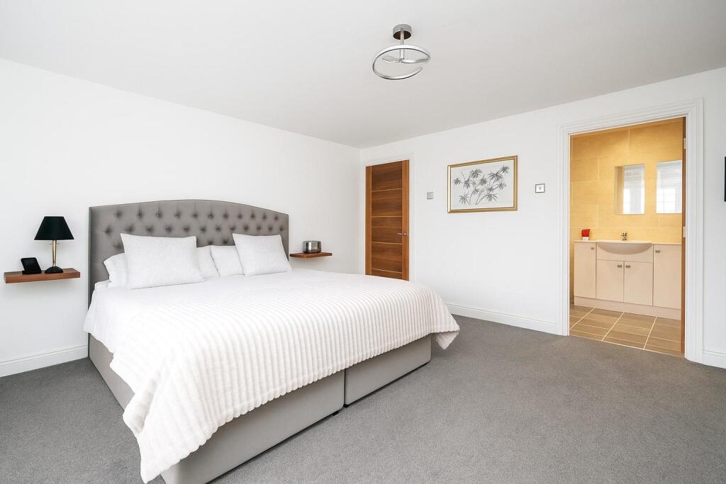 Spacious Bedroom with Modern Ensuite.jpg