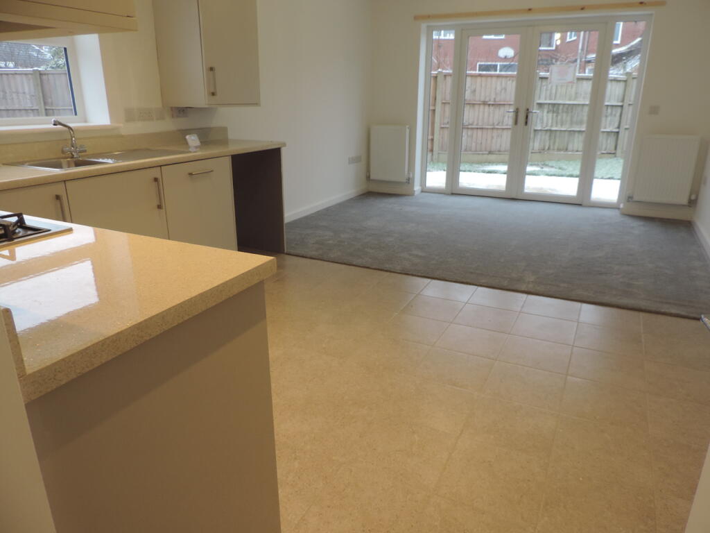 open plan kitchen . lounge