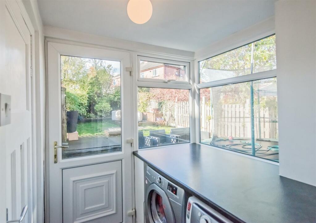 Utility Room / Rear Porch: