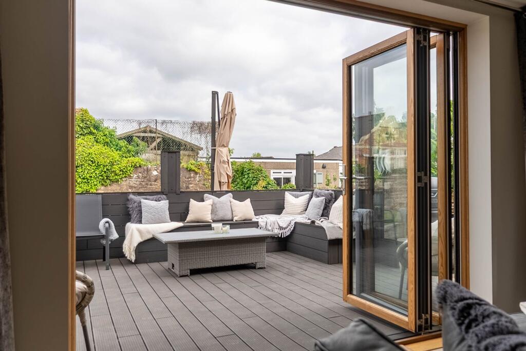 Bifolds from the sitting room to the garden terrace