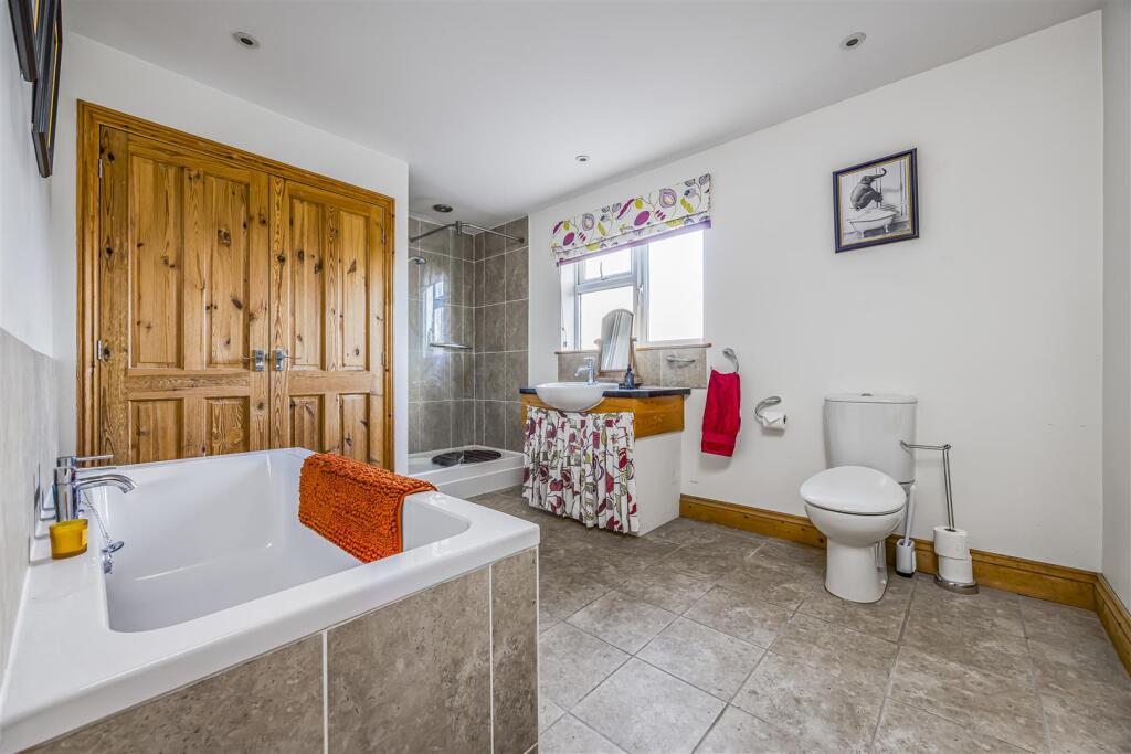 Madakery, South Lane, Woodmancote-PorticoMarketing