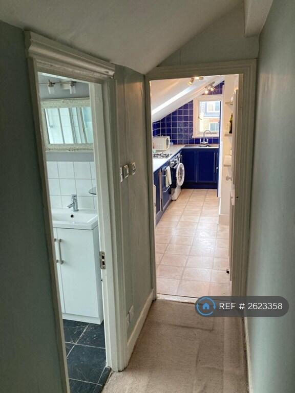 Hallway Into Kitchen And Bathroom