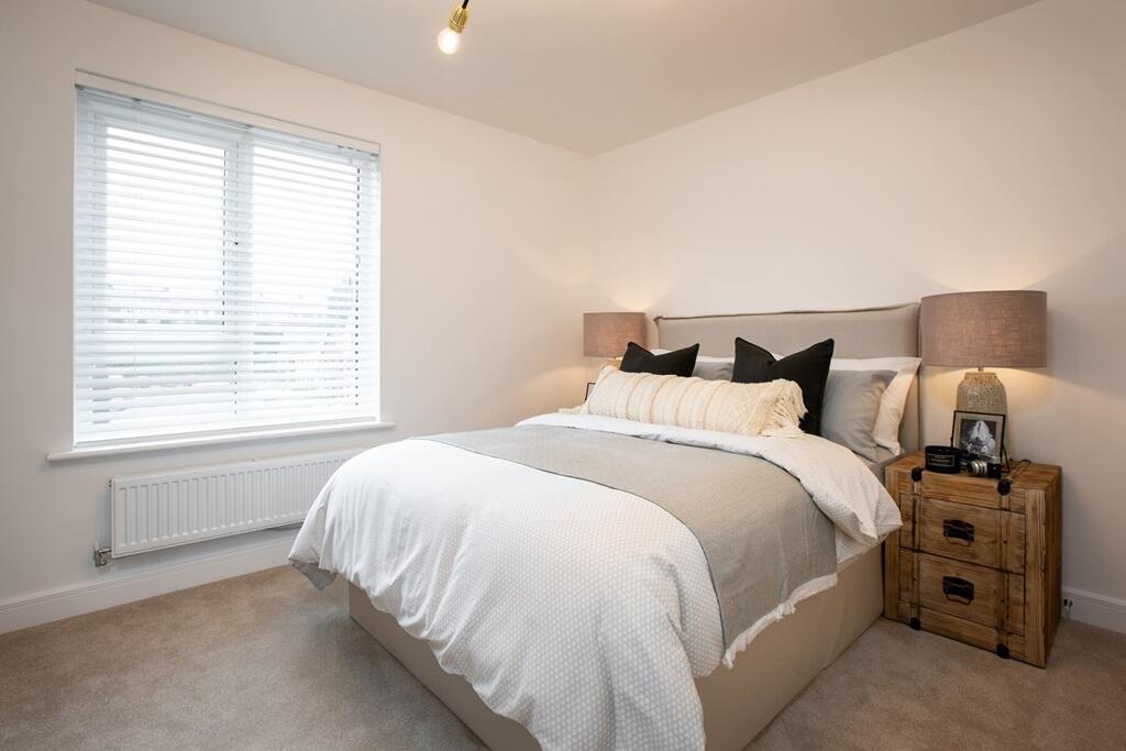 A spacious second double bedroom