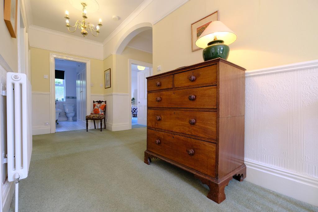 Elegant landing to 4 double bedrooms