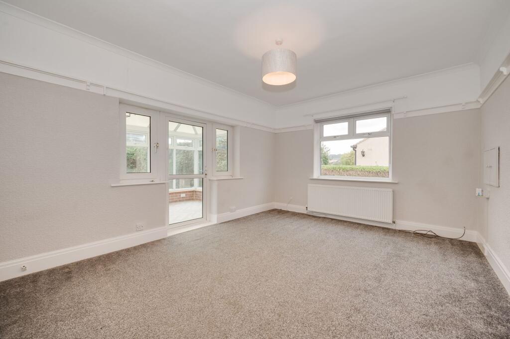 KITCHEN, LIVING ROOM AND CONSERVATORY