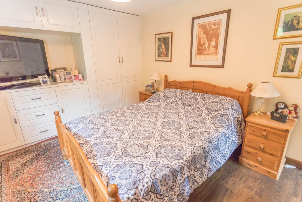 Bedroom 1 with wardrobes