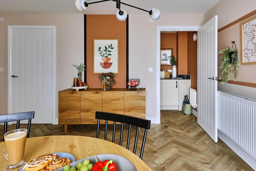 The kitchen and dining area also leads to a dedicated utlity area