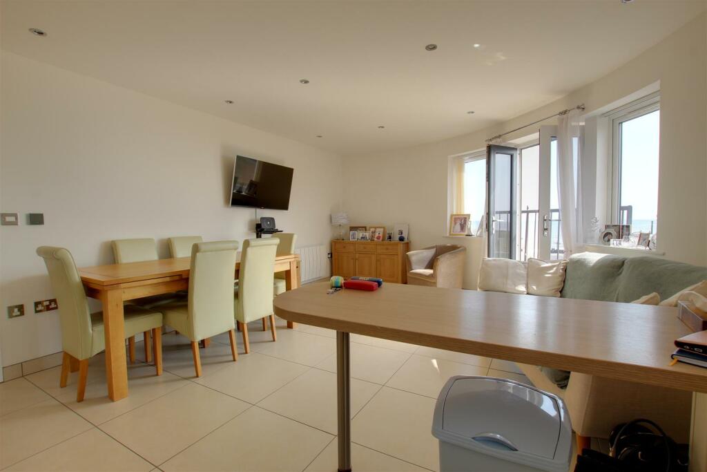 LIVING ROOM WITH KITCHEN AREA