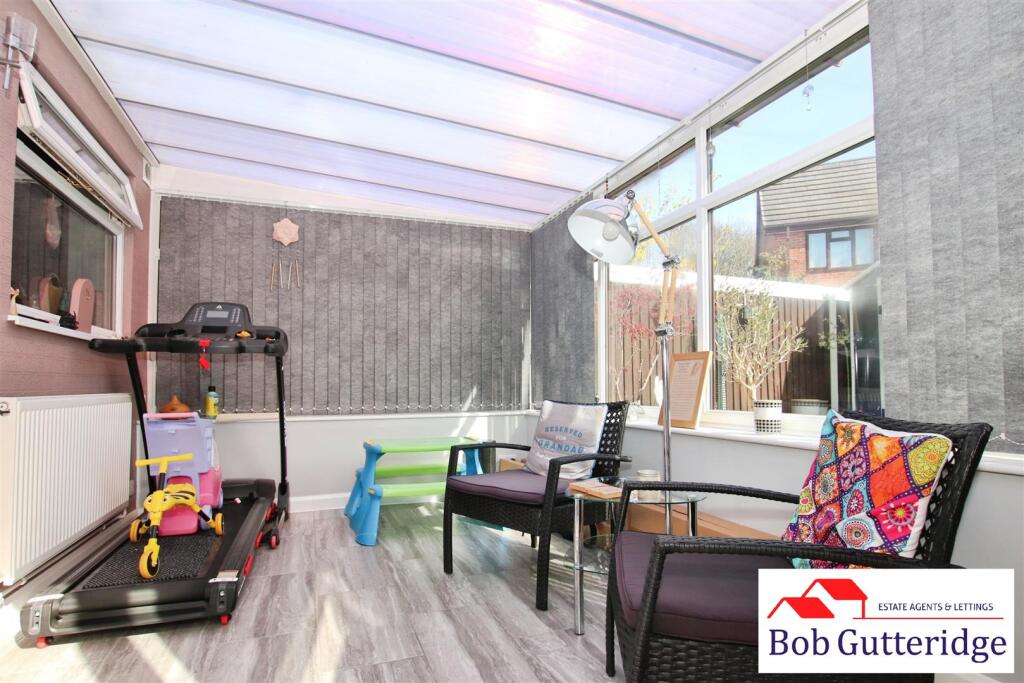 HALF BRICK AND UPVC DOUBLE GLAZED CONVERVATORY