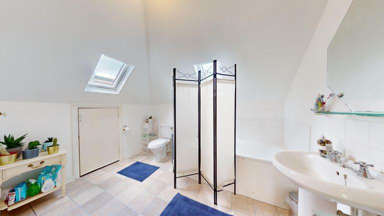 Sizable bathroom with window