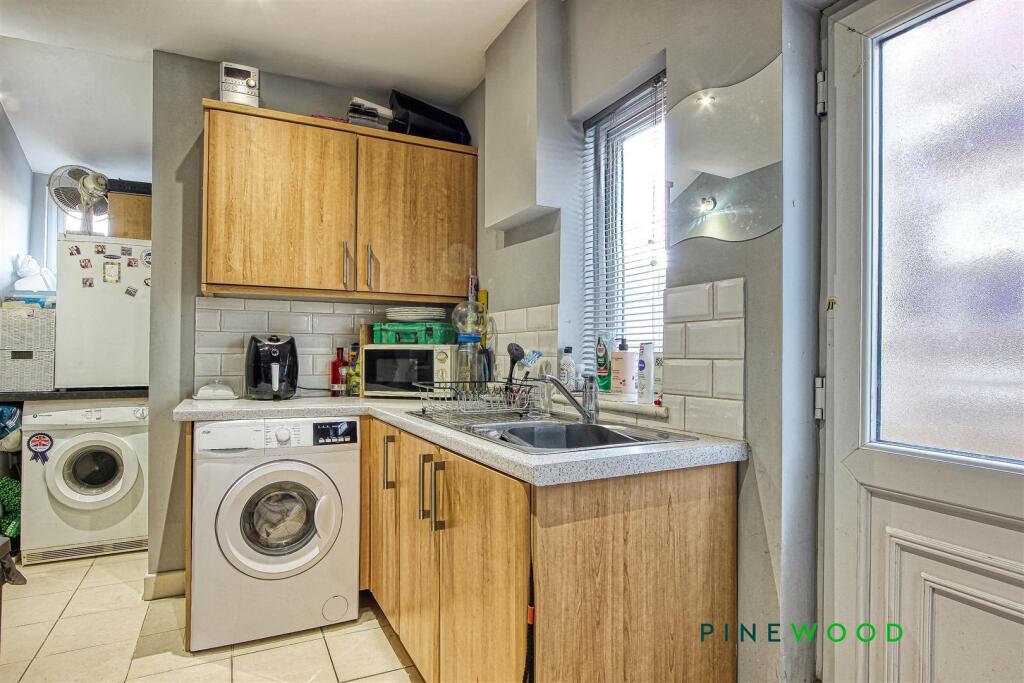 KITCHEN AND UTILITY AREA