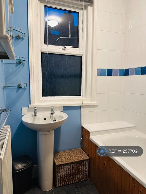 Bathroom With Shower Over Bath