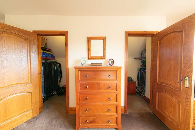 Twin walk in wardrobes (bedroom 1)
