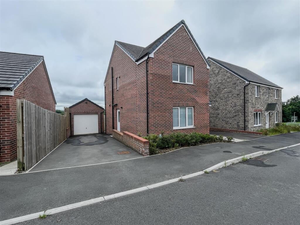 44 Tasker Way Photo-Driveway + Front Elevation.jpg