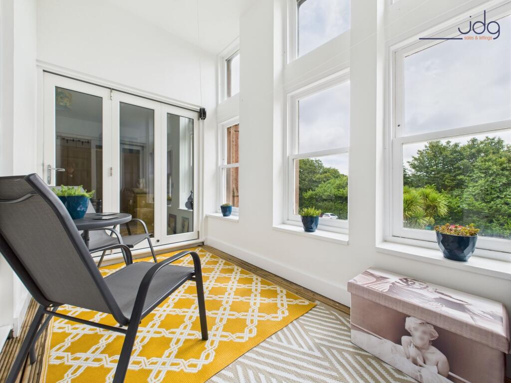 Balcony Area with Entrance to Living Room and Bedroom