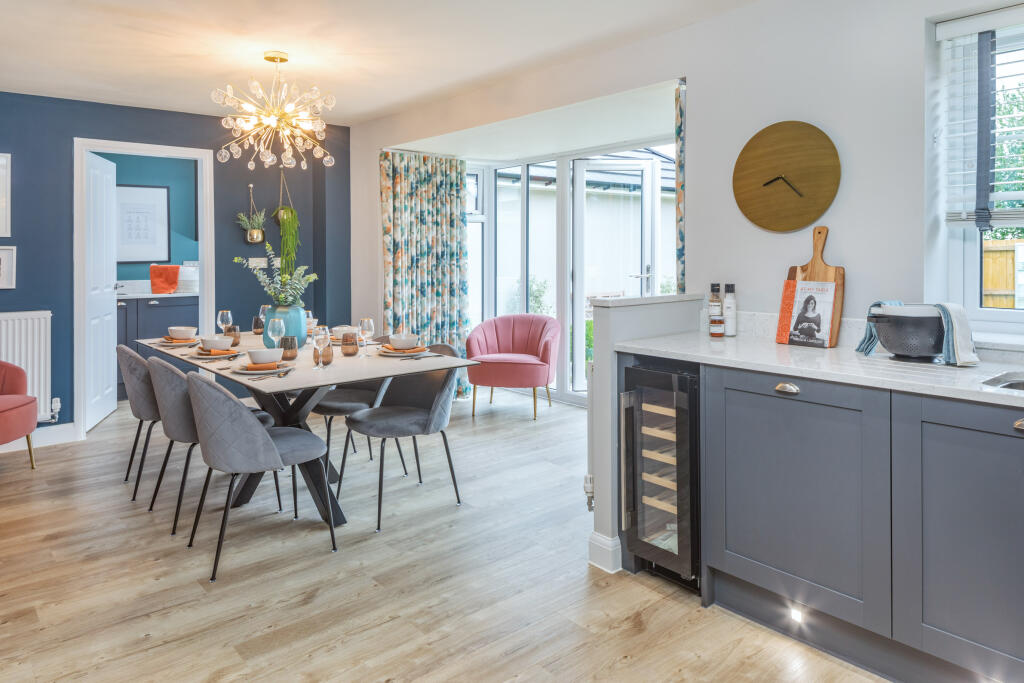 Open plan kitchen dining room in the Holden 4 bedroom home
