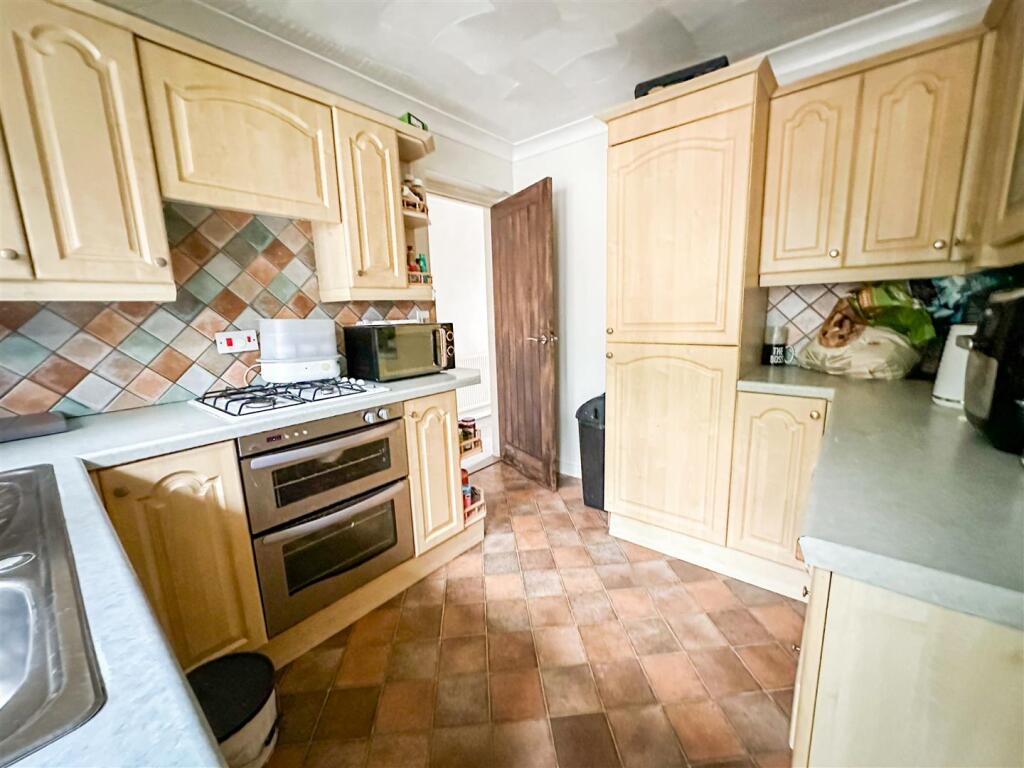 ALTERNATE VIEW OF KITCHEN