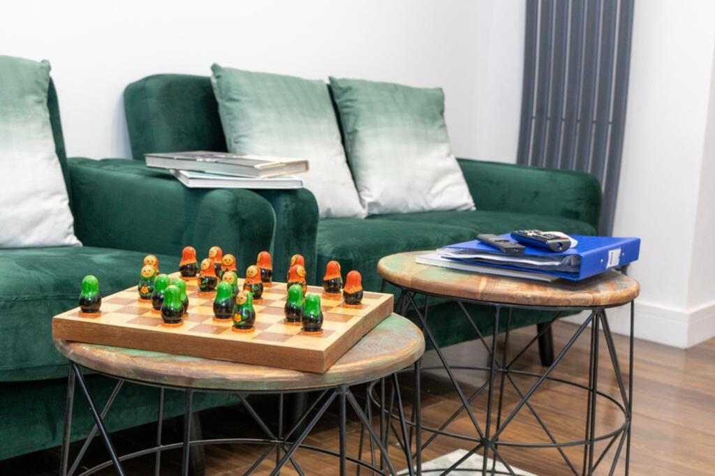 A stylish and inviting living room featuring co...