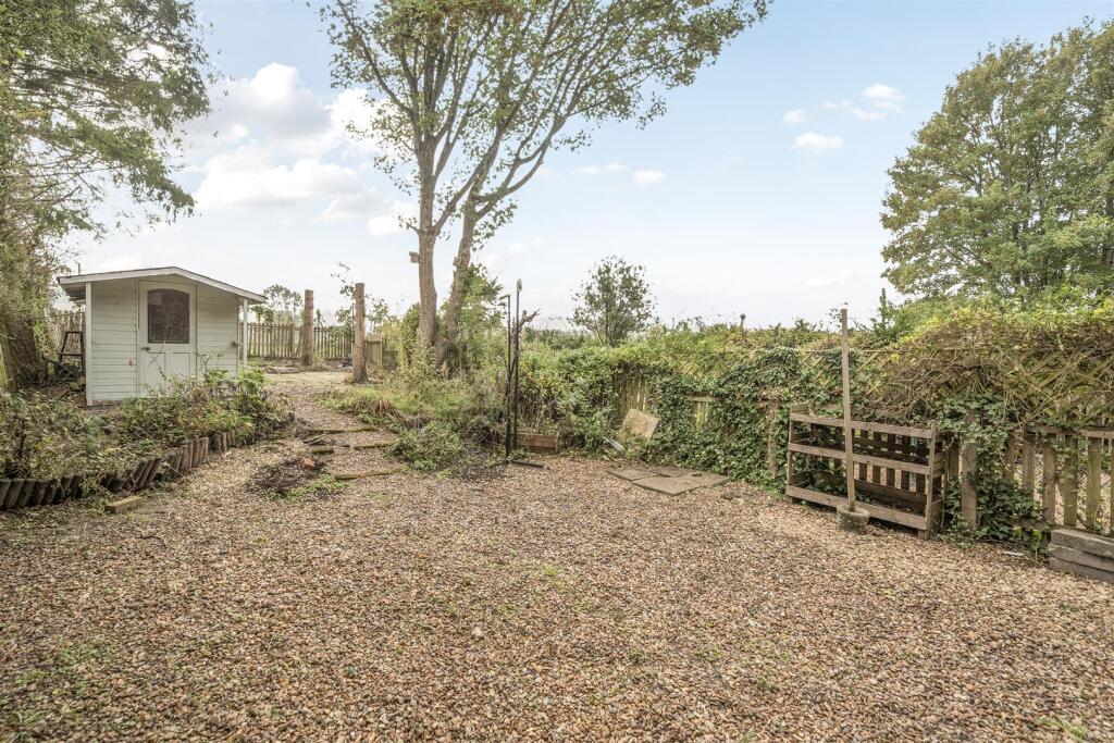 Rear garden with summerhouse