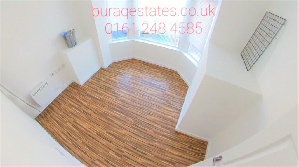 Bright and clean toilet area with modern wood-e...