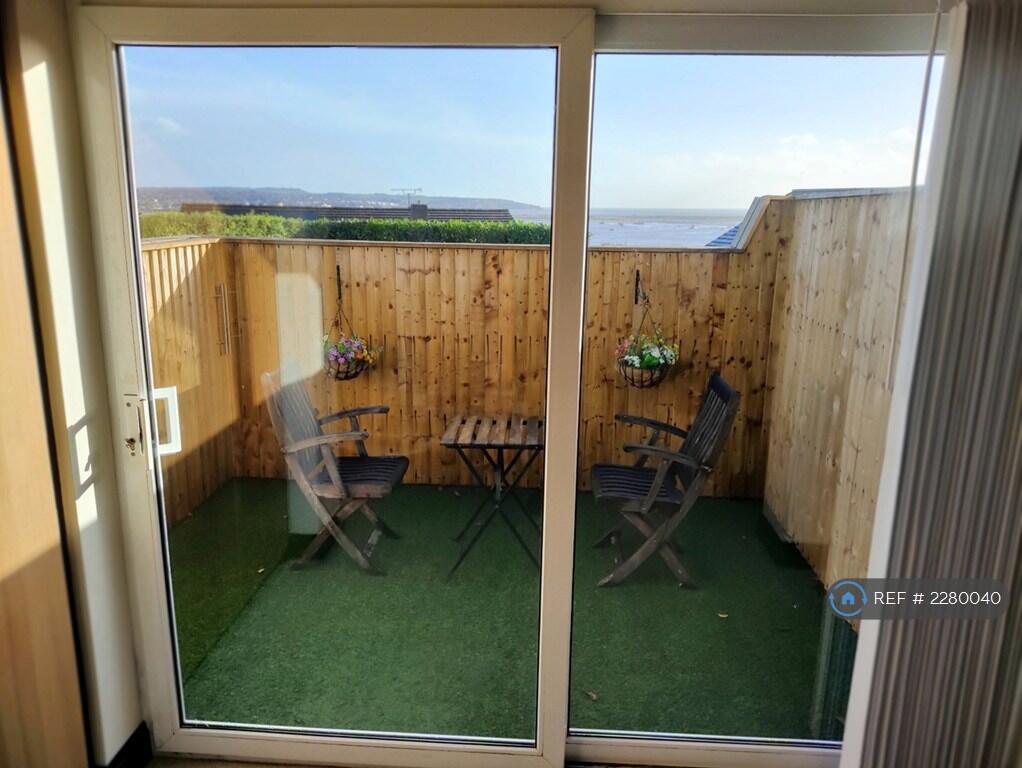 Outside Patio Space With Seating &amp; Table 