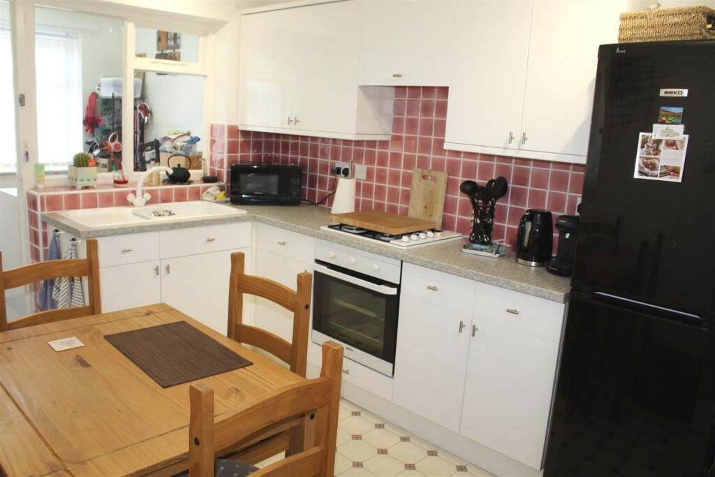 KITCHEN AND DINING ROOM