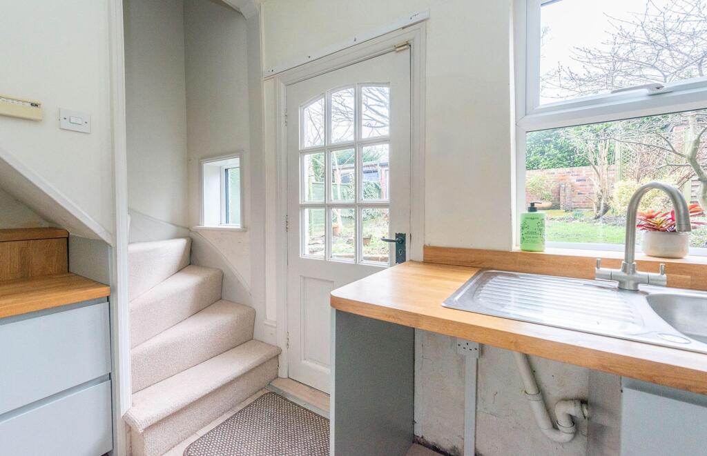 SITTING ROOM AND KITCHEN