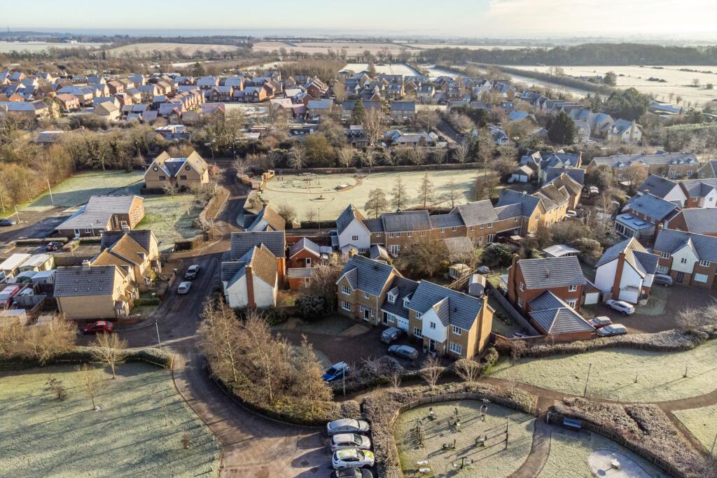 Aerial view of the home and surroundings
