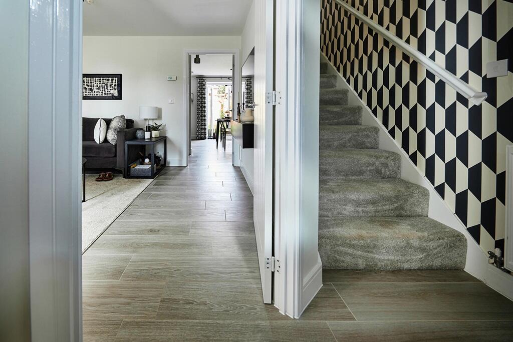 The hallway opens up to the living room