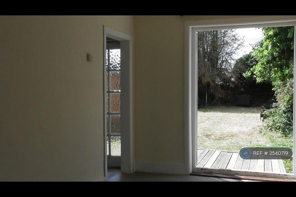 Large Liviing Room Opening To Patio