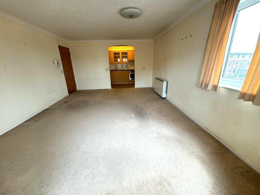 LOUNGE INTO KITCHEN