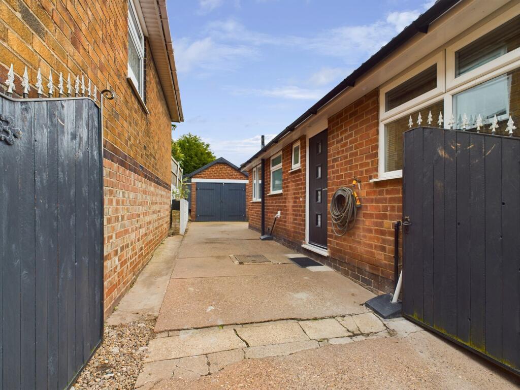 Driveway with Gated access to Garage