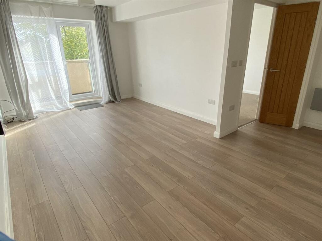 Open plan entrance, lounge and kitchen