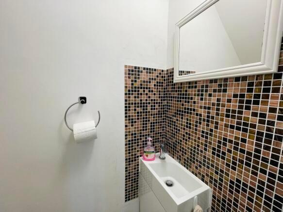 A well-maintained single toilet featuring styli...