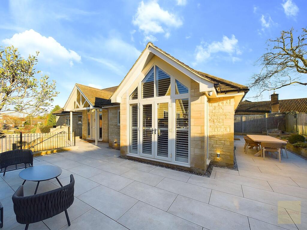 View of two patio areas from the front of the property