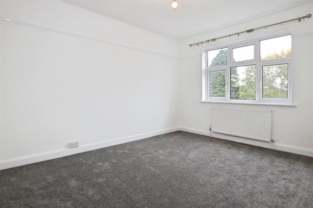 BEDROOM ONE (REAR)