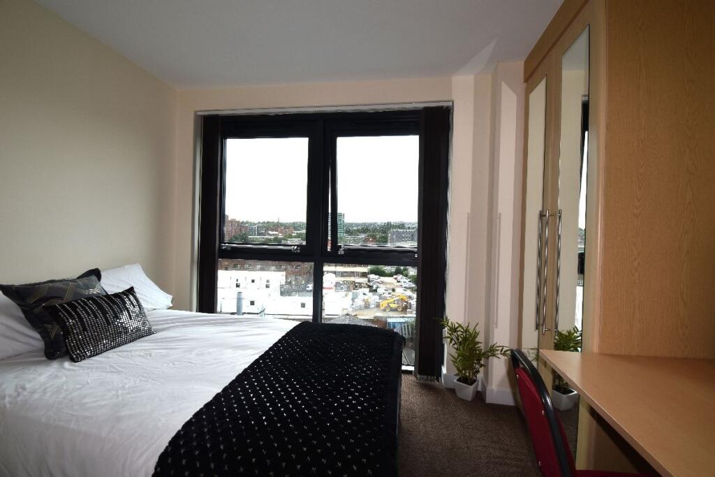 Bright and inviting master bedroom featuring a ...