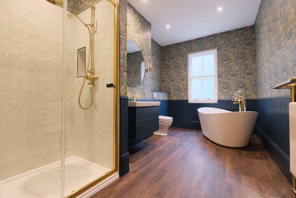Family bathroom with shower and bath