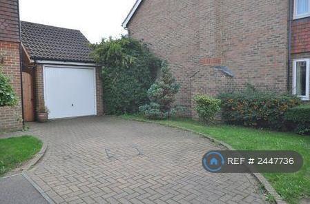 Detached Garage And Driveway