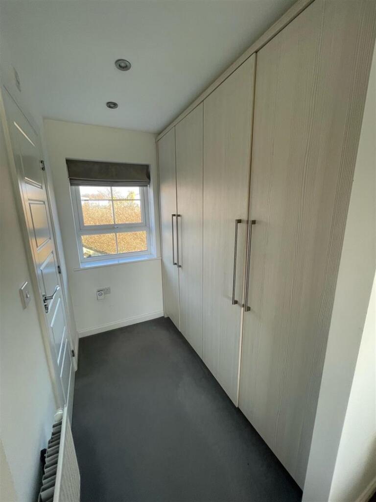 BEDROOM ONE WARDROBES
