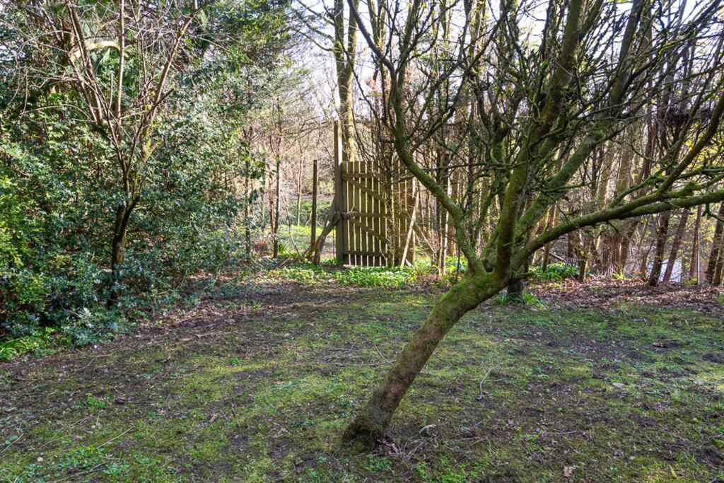 Private gate leading to John Muir walkway