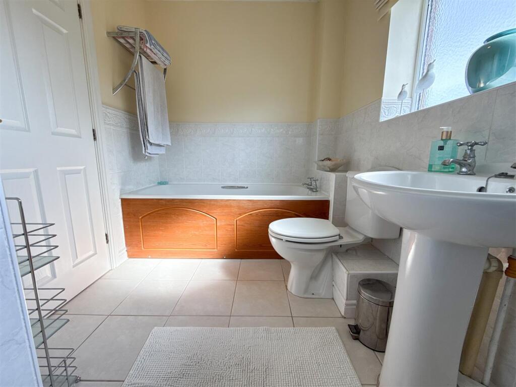 FAMILY BATH AND SHOWER ROOM