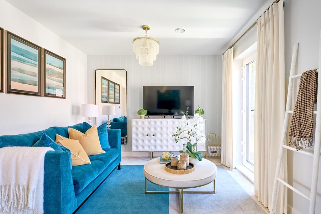 A bright and airy living room is found on the first floor