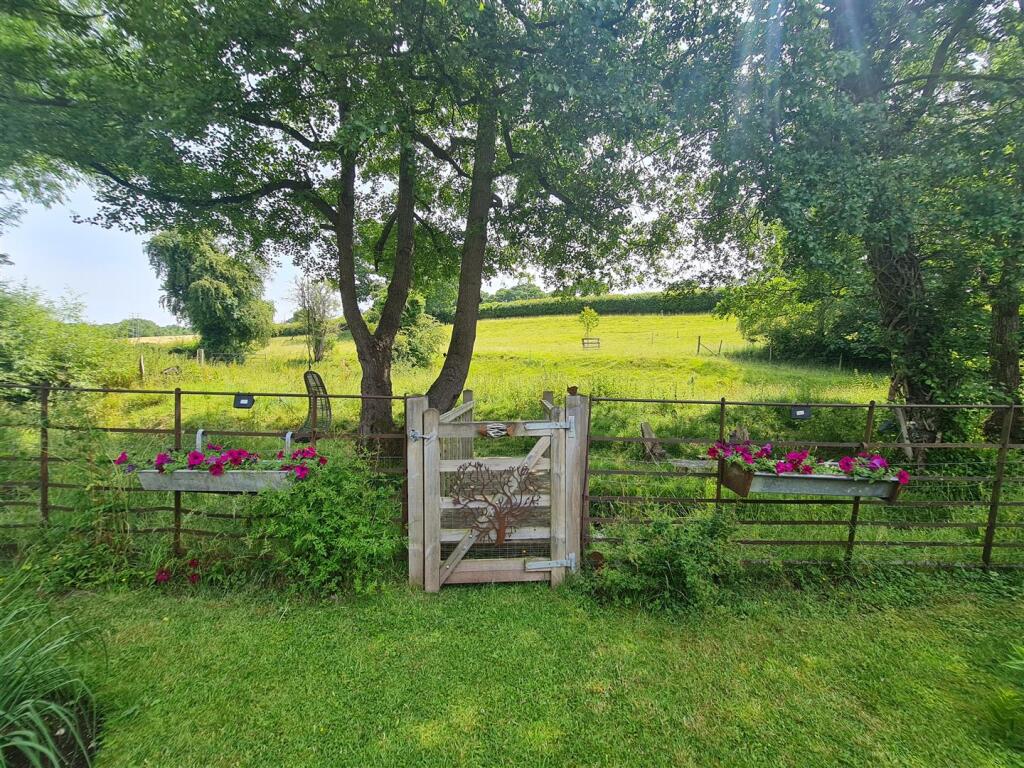 Pedestrian bridge over stream.jpg