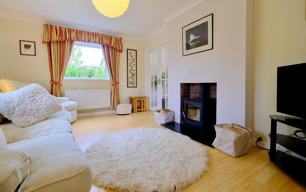 Comfortable sitting room with log burner