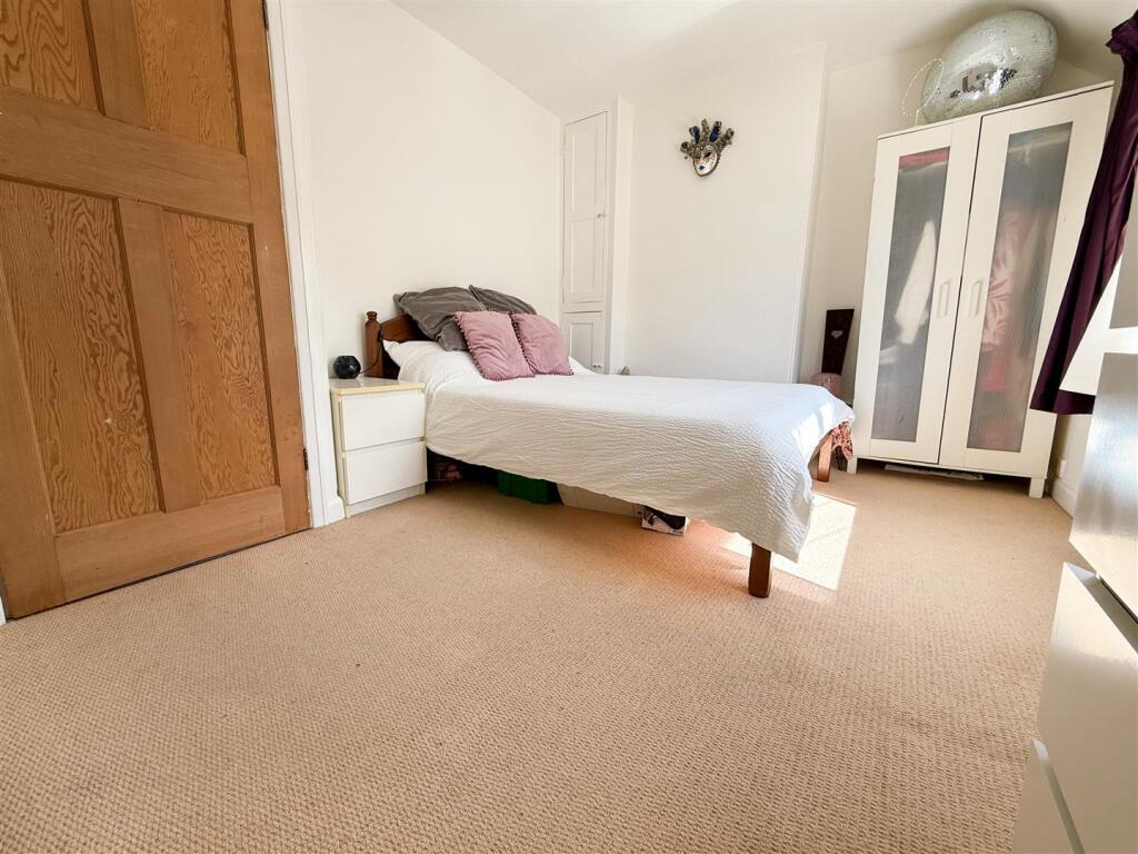 PRIMARY BEDROOM ONE