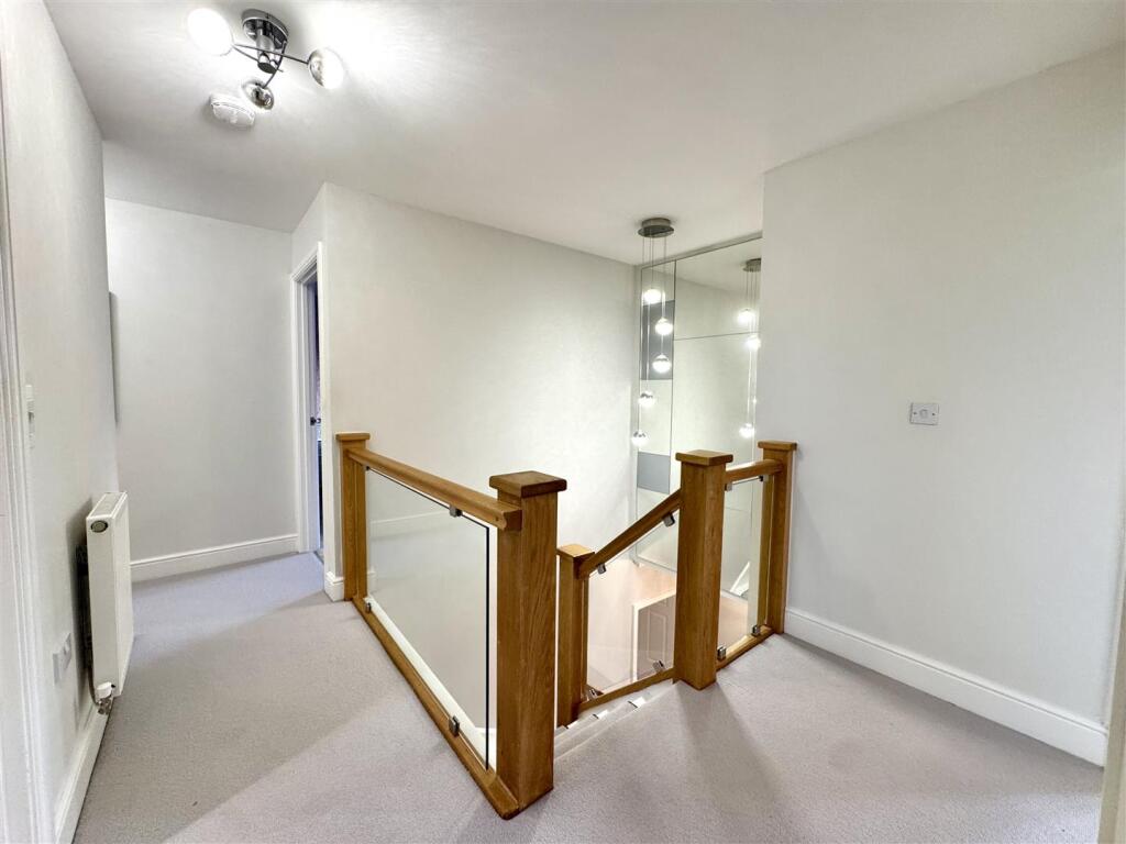 FIRST FLOOR STAIRS AND LANDING