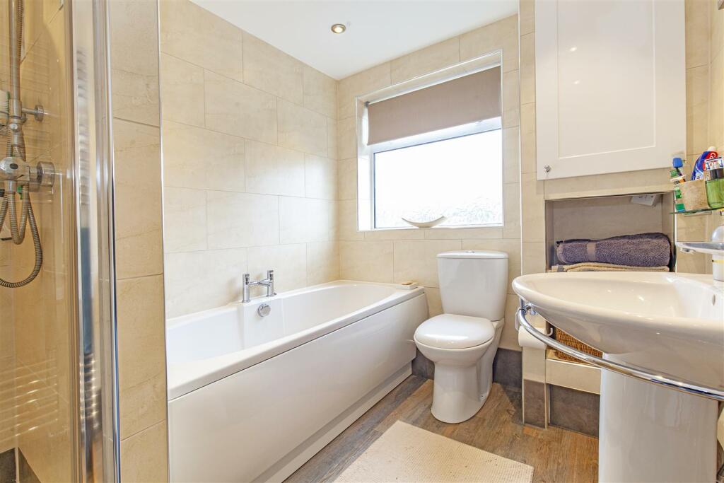 Fully Tiled Family Bathroom